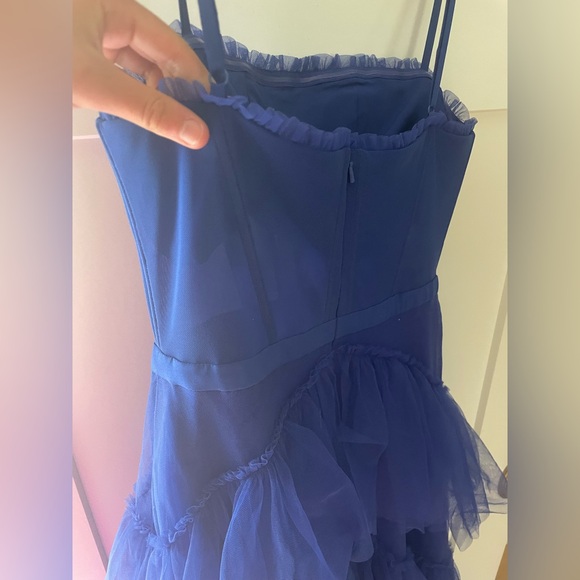 It is made of a mesh material, it is see through on the stomach only, blue dress - Picture 9 of 10